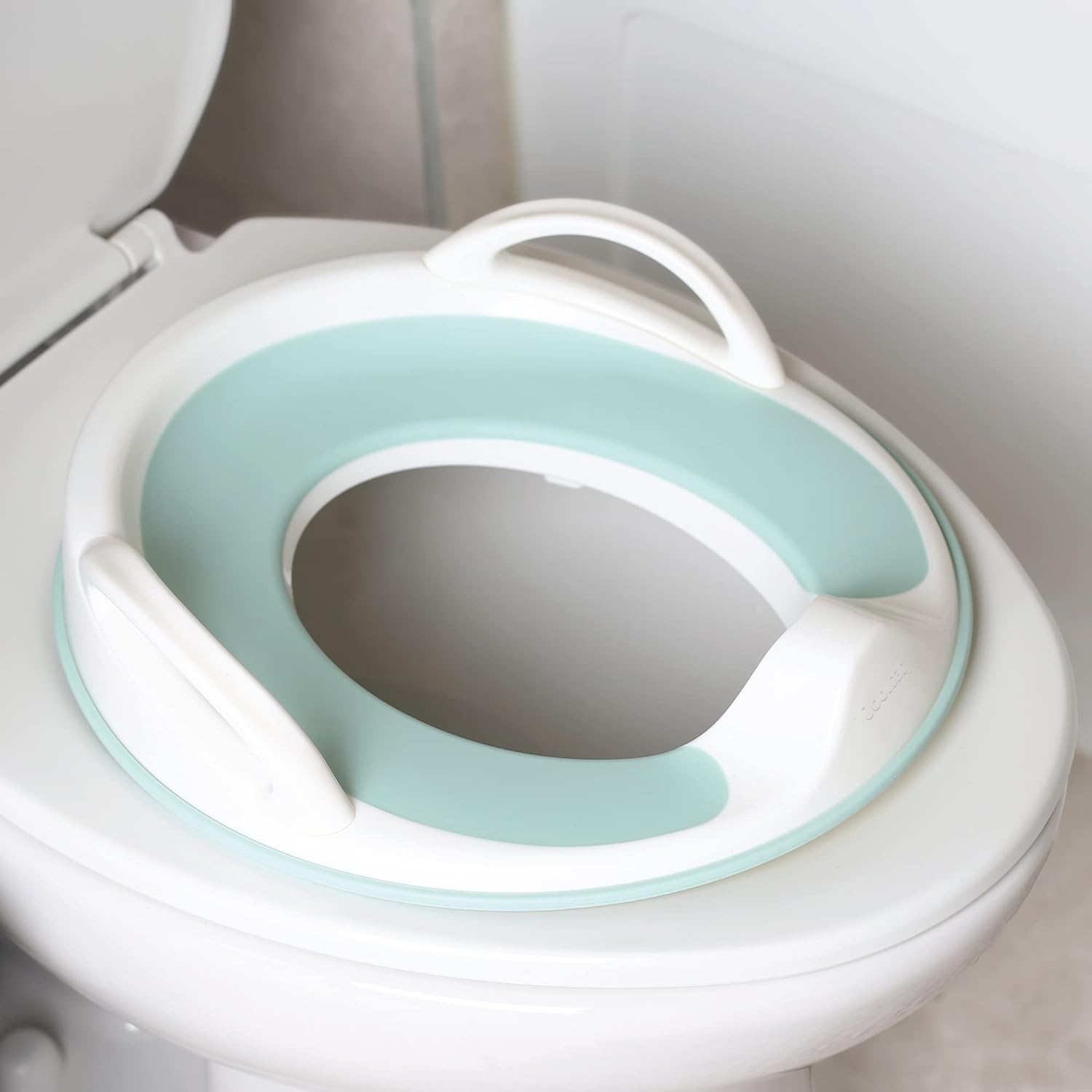 Angelcare Baby Products Potty Training Seat for Boys and Girls with Handles, Fits Round & Oval Toilets, Non-Slip with Splash Guard, Includes Free Storage Hook